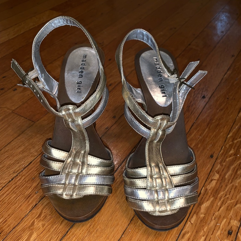 Platform heel open toe sandals.